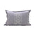  pillow with white cane pattern on a lilac background